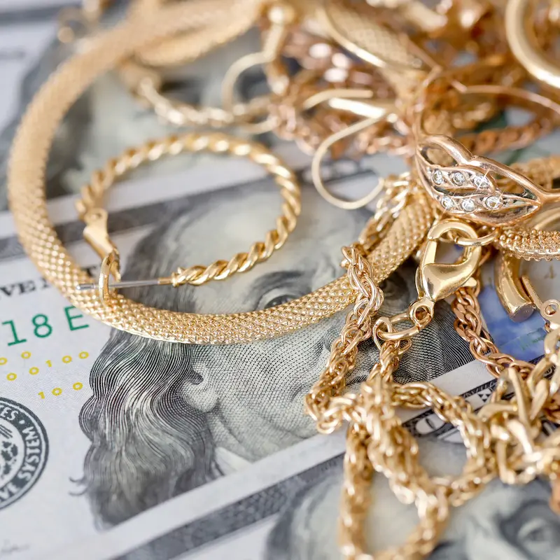 A pile of jewelry on a white background